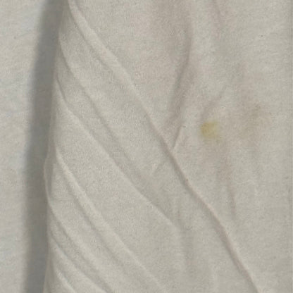 Close-up of small yellowish stain on white sleeve of Fanatics Washington Commanders hooded shirt.