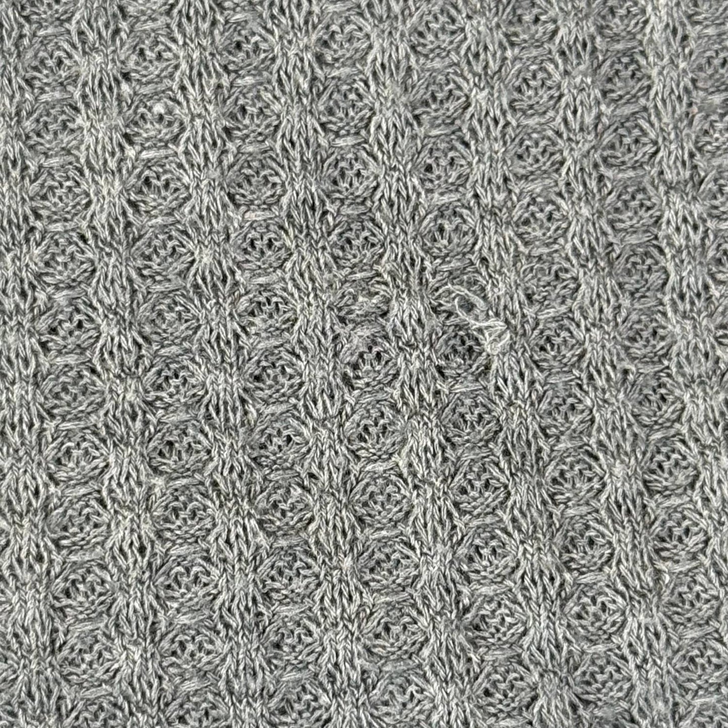 Small snag on green pajama set fabric