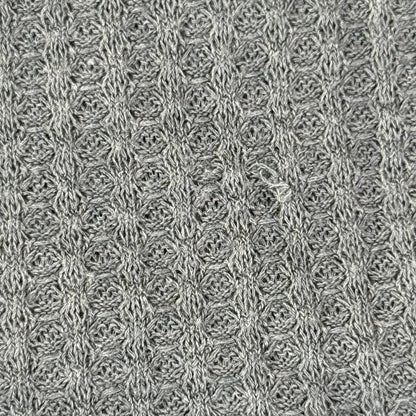Small snag on green pajama set fabric