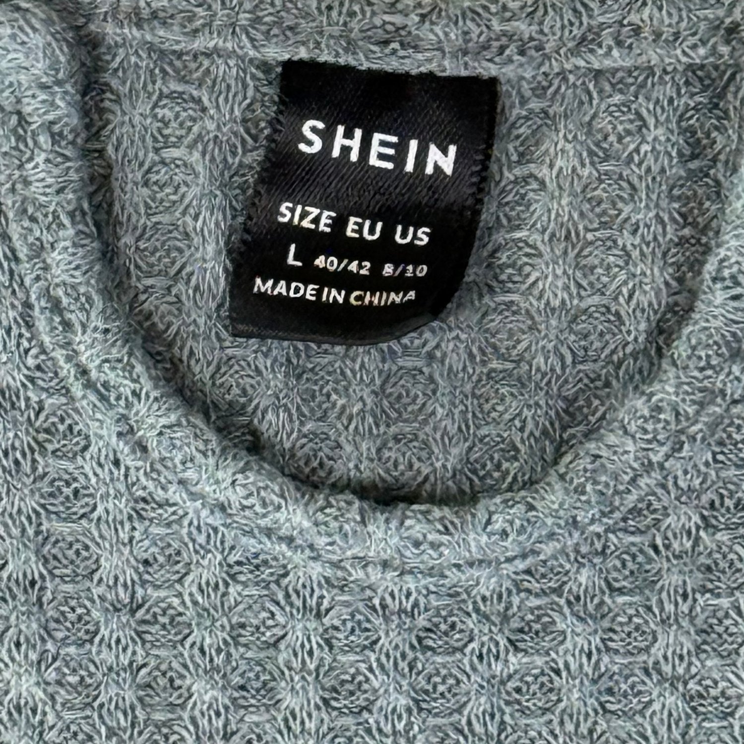 Waffle knit texture fabric close up tag