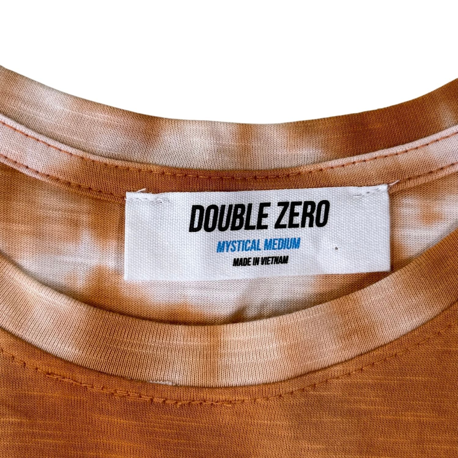 Double Zero brand tag on orange tie-dye shirt