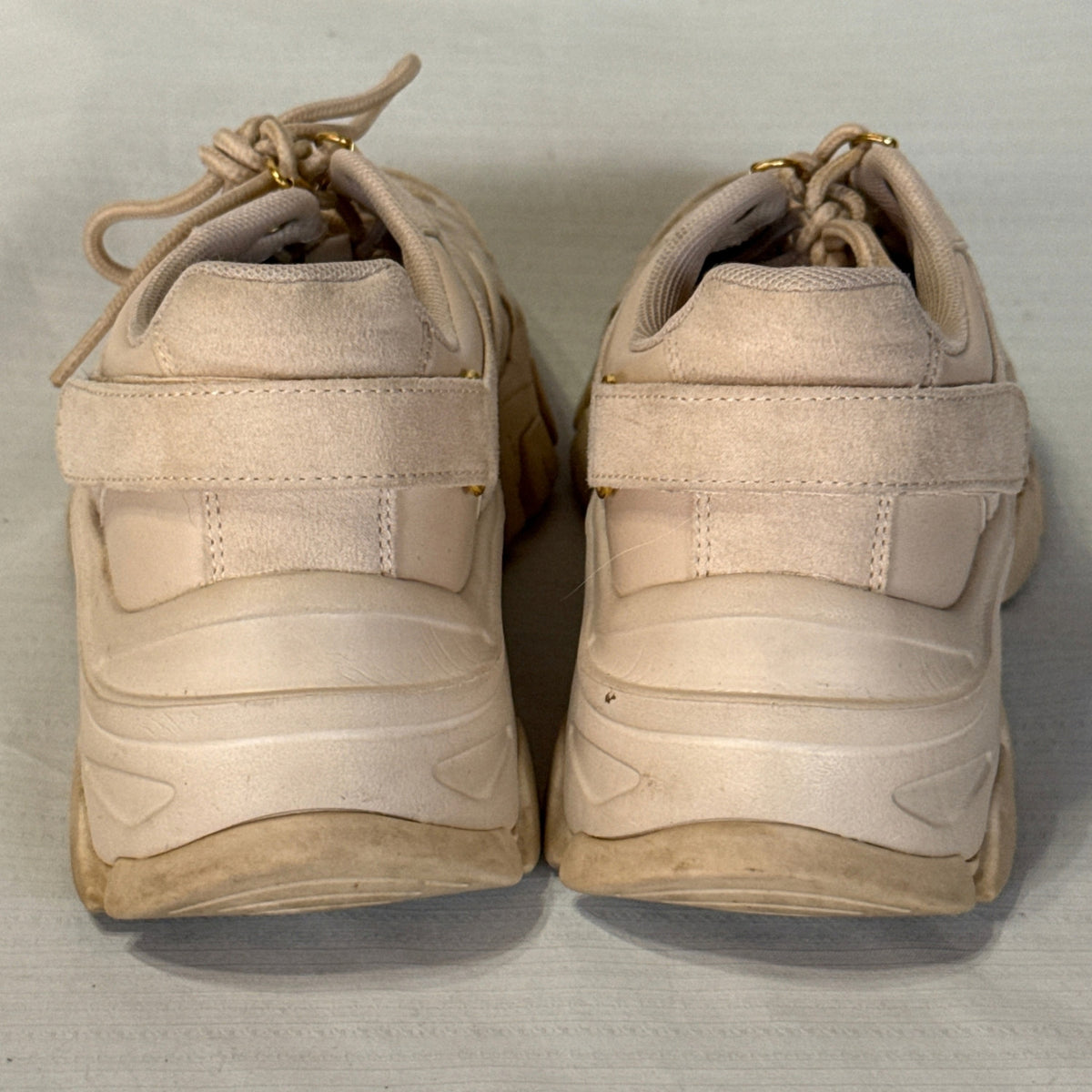 Back view of JustFab Ximena chunky sneakers showing heel straps, padded collars, and thick sculpted soles.