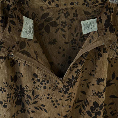 Close-up of Kathie Lee Collection clothing label, size 12, inside brown and black floral polyester skirt.