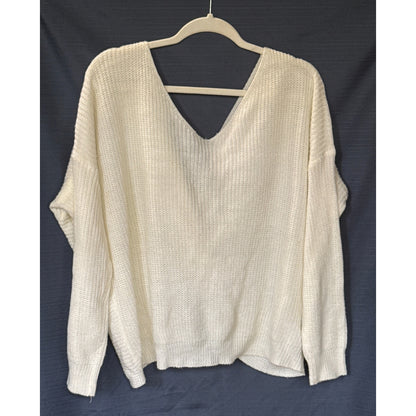 Back view of an ivory Lara Fashion sweater with a V-shaped neckline, long sleeves, and ribbed hem.