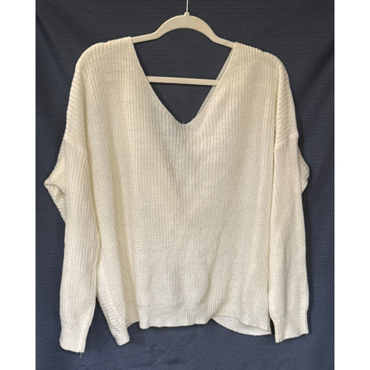 Back view of an ivory Lara Fashion sweater with a V-shaped neckline, long sleeves, and ribbed hem.