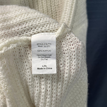 Lara Fashion sweater care label showing 100% acrylic, size L/XL, and hand wash cold and dry flat instructions.