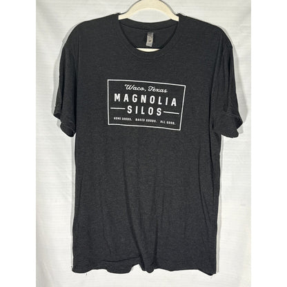 Front of heather black Magnolia Silos Waco graphic T-shirt with white print.