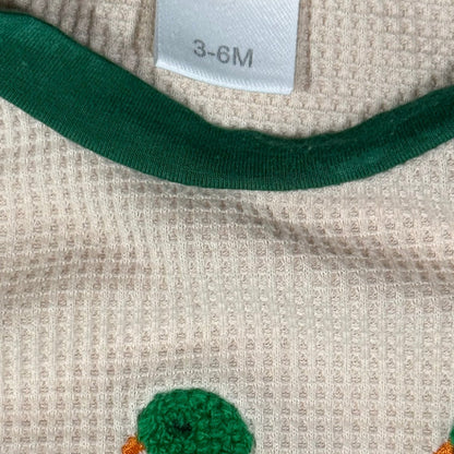 Mallard duck embroidery on baby onesie tag