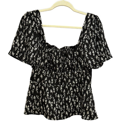 Mi Ami women's large black floral smocked peplum top with flutter sleeves.