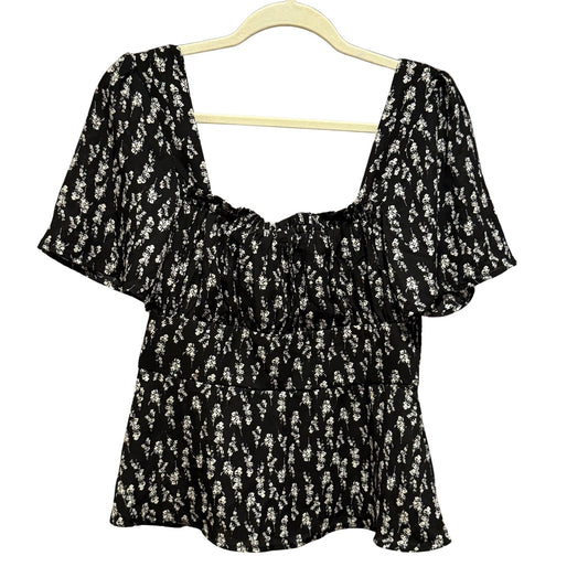 Mi Ami women's large black floral smocked peplum top with flutter sleeves.