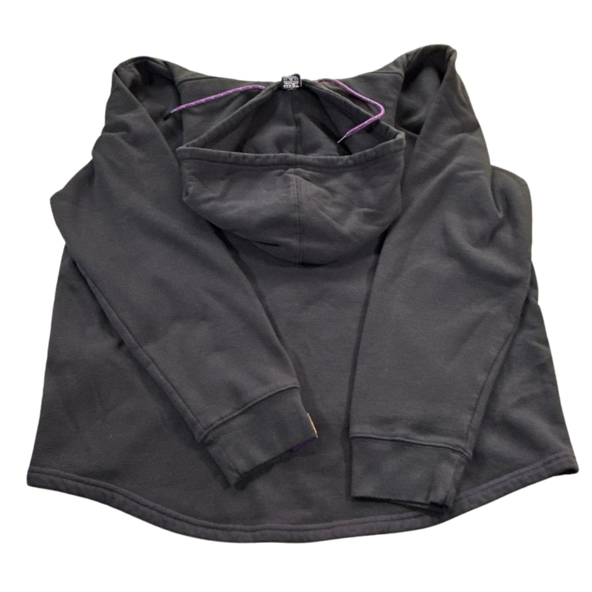 Back view of black Minnesota Vikings women’s XL hoodie showing the plain back, long sleeves, hood, and curved hem