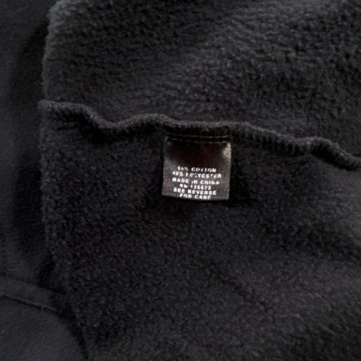 Interior fabric and care label on the NFL Team Apparel Minnesota Vikings hoodie