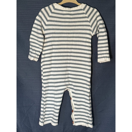 Back of Mud Pie baby sweater romper with white and gray horizontal stripes, long sleeves, and full-length legs.