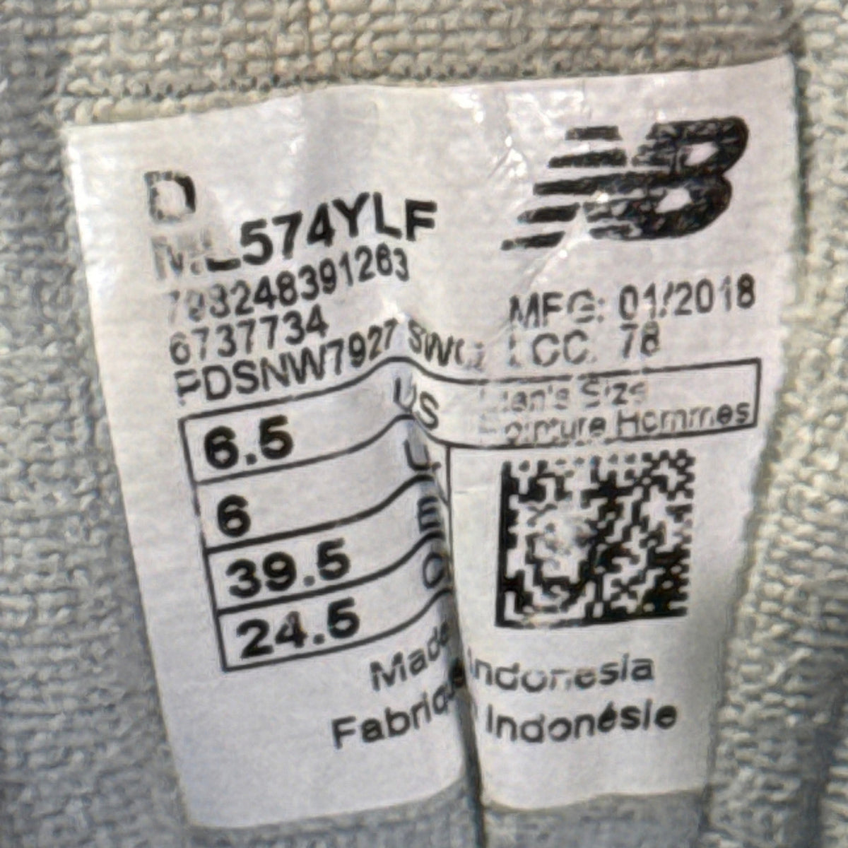 New Balance ML574YLF size label showing men’s US 6.5, width D, UK 6, and EU 39.5.