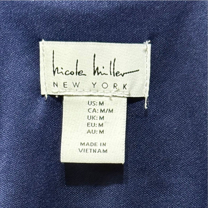 Nicole Miller New York brand tag showing women's medium size.
