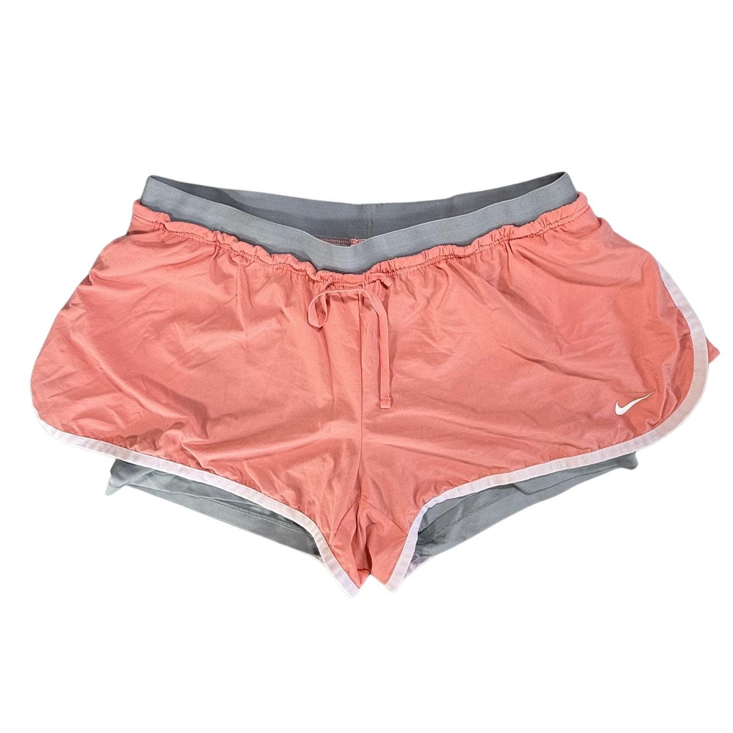 Orange Nike Dri-FIT athletic shorts with gray and white trim