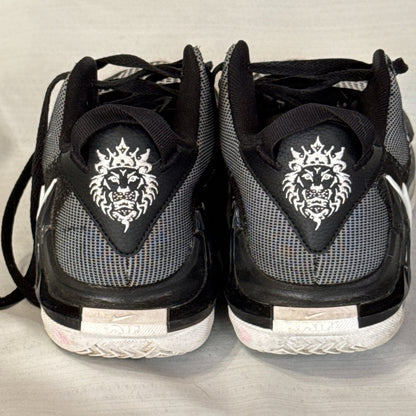 Back of Nike LeBron Witness 7 sneakers featuring white lion graphics and black and gray mesh.