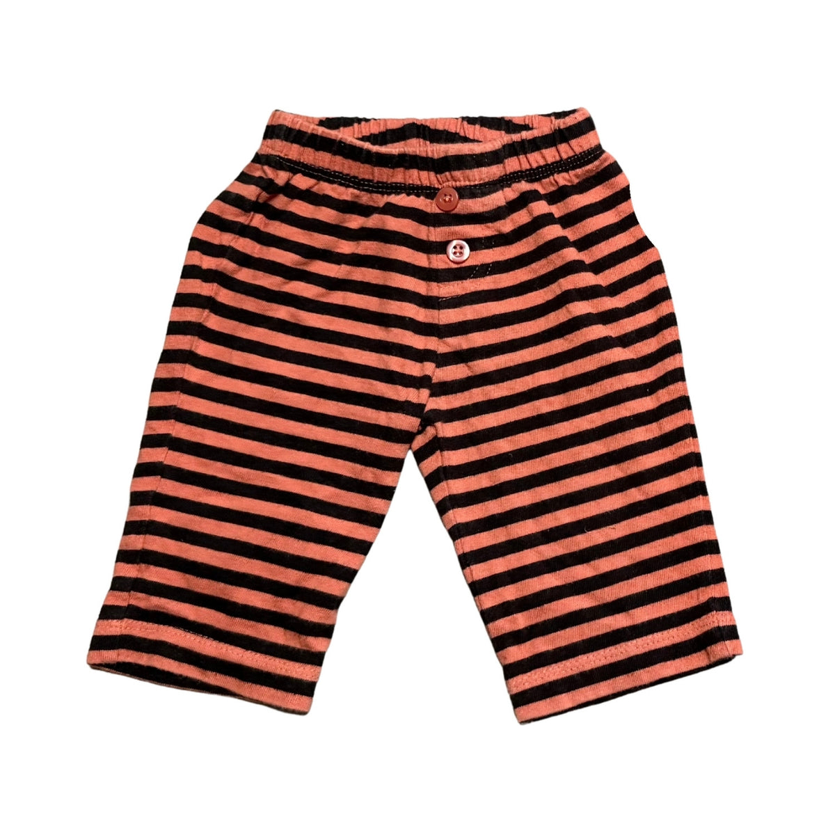 Old Navy orange and black striped cotton baby pants size 0–3 months with elastic waistband and decorative front buttons.
