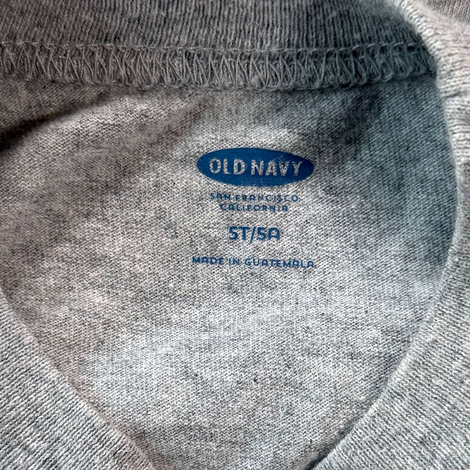 Old Navy size 5T label inside heather gray boys shirt