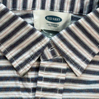 Old Navy brand label and collar detail on boys striped button-up shirt