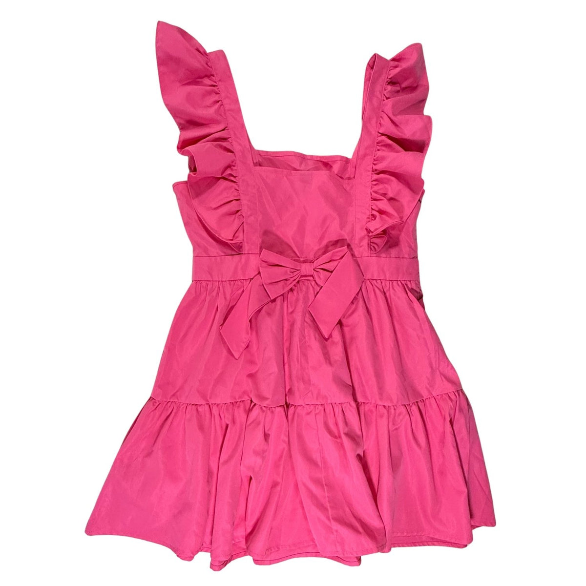 Back view of SHEIN bright pink mini dress with a decorative bow detail and tiered ruffle skirt.