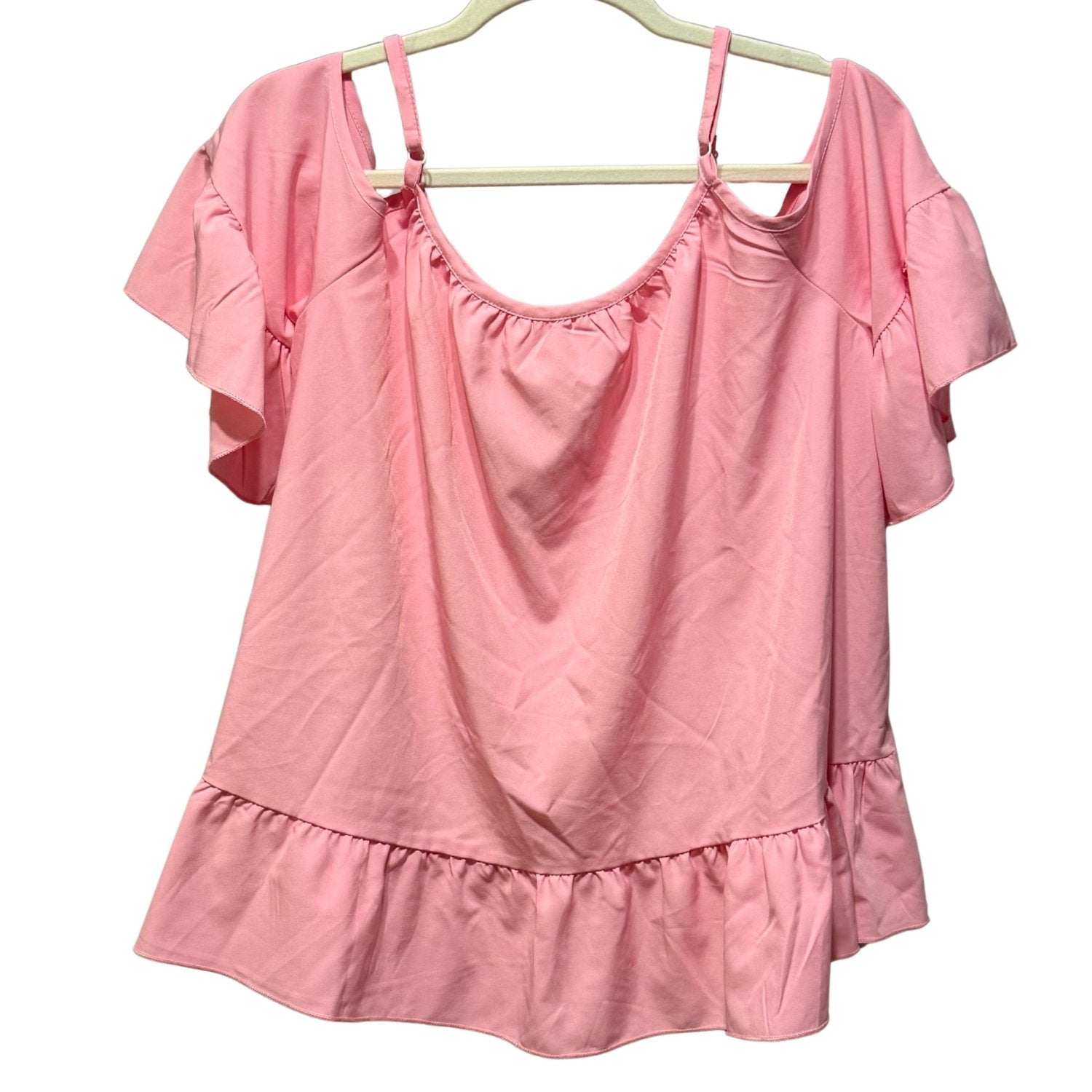 Back view of SHEIN pink off shoulder ruffle top with flutter sleeves and ruffle hem.