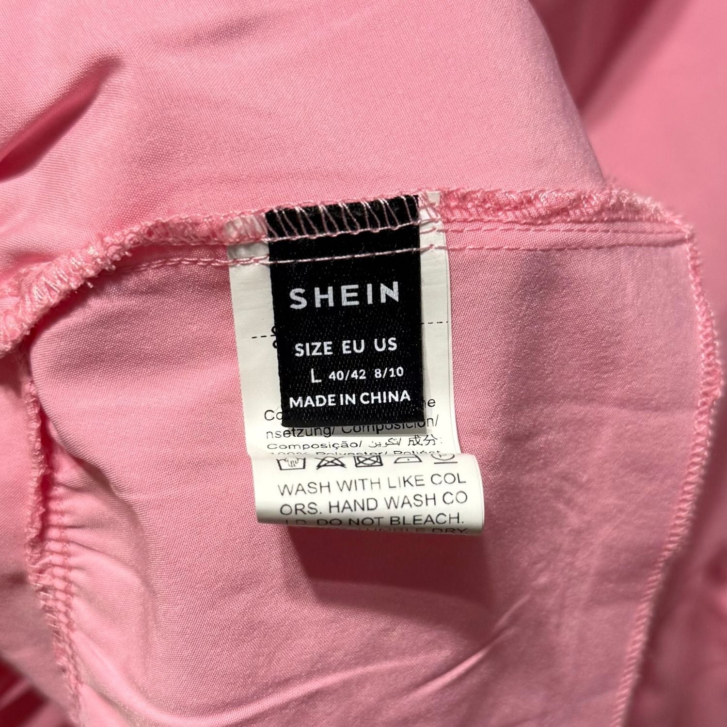 SHEIN size Large tag showing brand and garment size.