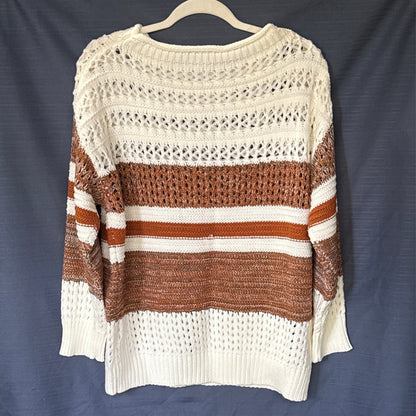 Back of a women’s SHEIN sweater with cream, brown, and burnt orange horizontal stripes, open-knit details, and long sleeves.