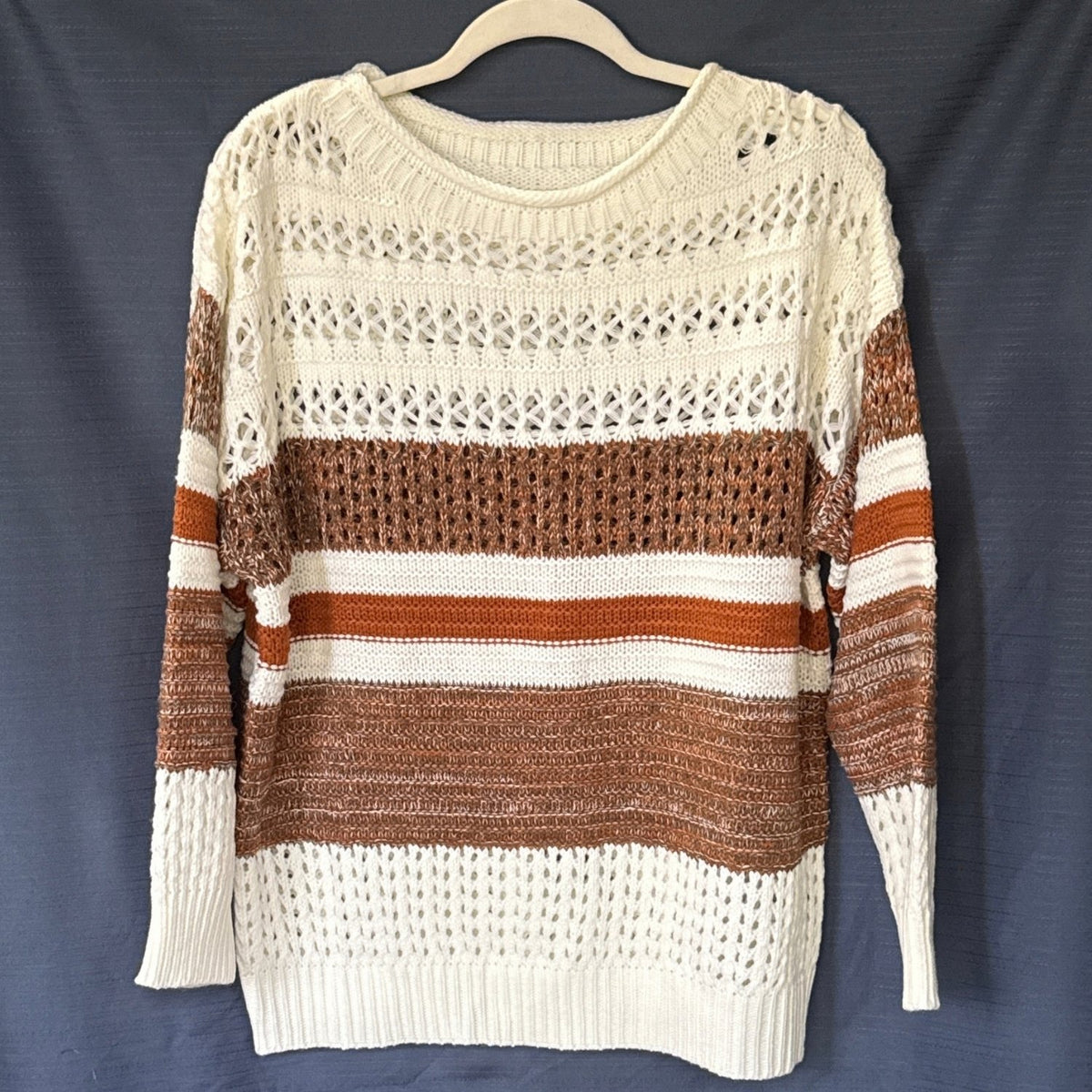 Front of a women’s SHEIN striped sweater with a wide round neckline, dropped shoulders, and ribbed cuffs and hem.