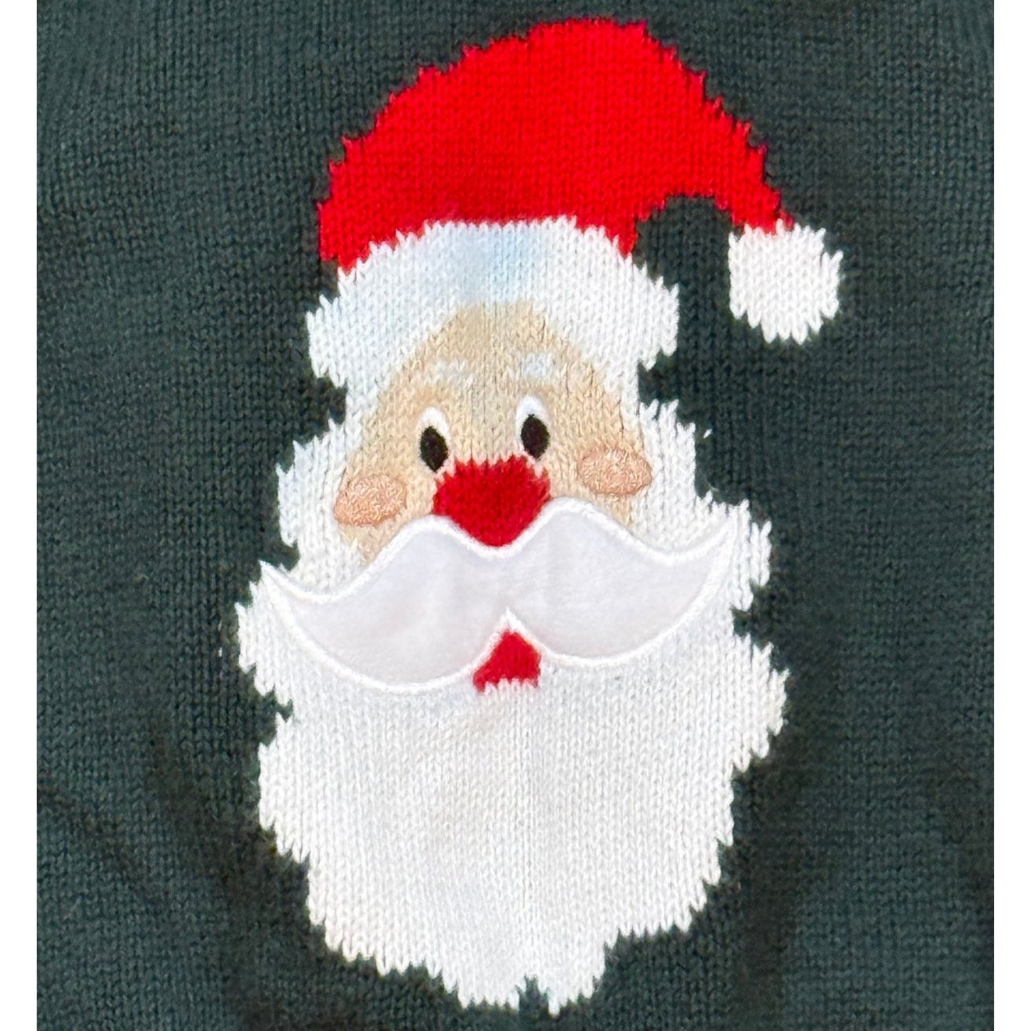 Close-up of Santa design with textured white mustache on Starting Out baby Christmas sweater