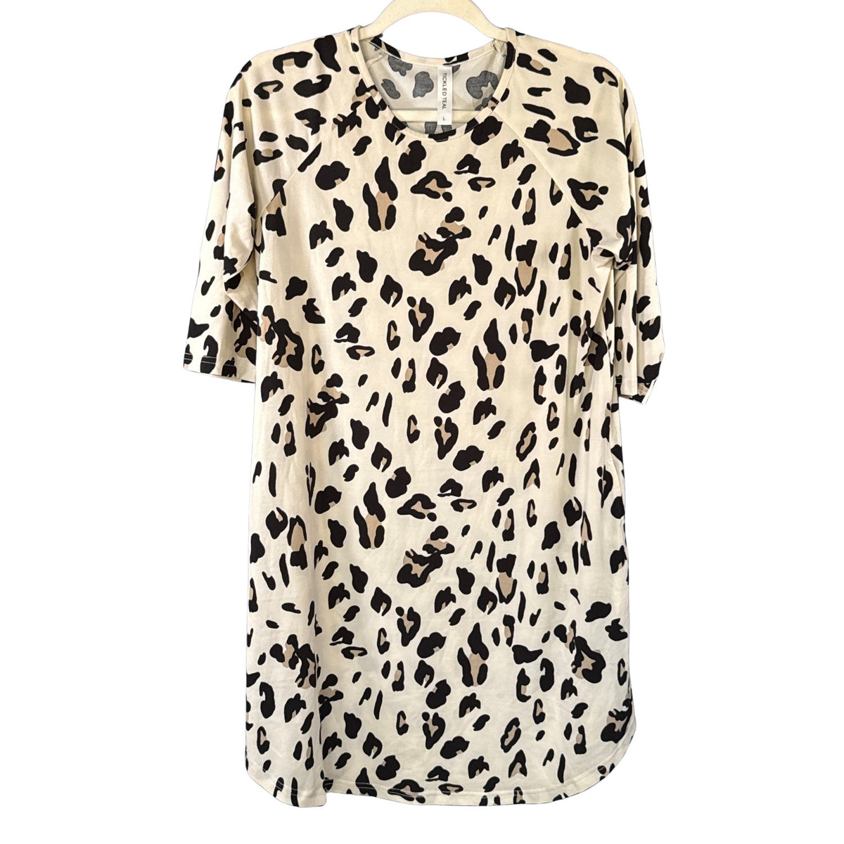 Tickled Teal women's large cream leopard print swing dress with black and brown spots, crew neckline, and 3/4 raglan sleeves.