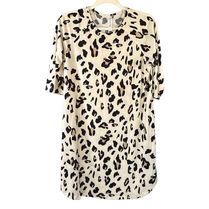 Tickled Teal women's large cream leopard print swing dress with black and brown spots, crew neckline, and 3/4 raglan sleeves.