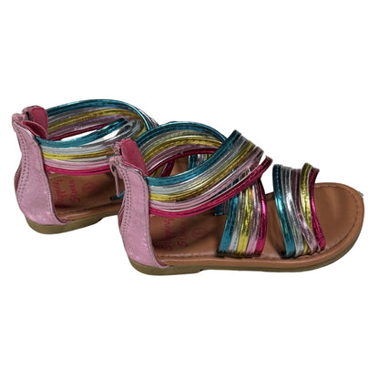 Colorful striped sandals metallic straps on a white background