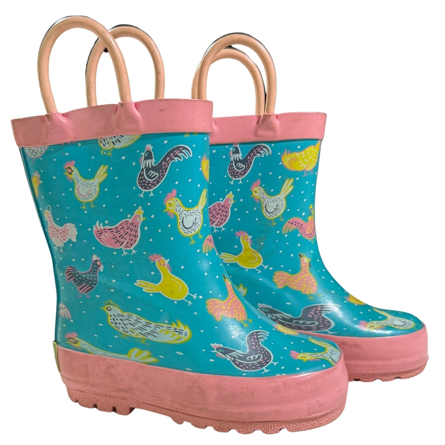 Side view of Western Chief waterproof rubber rain boots with colorful chicken pattern.