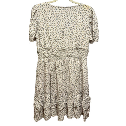 Back view of Wild Fable women's XL off-white floral dress with smocked waist and tiered ruffle hem.