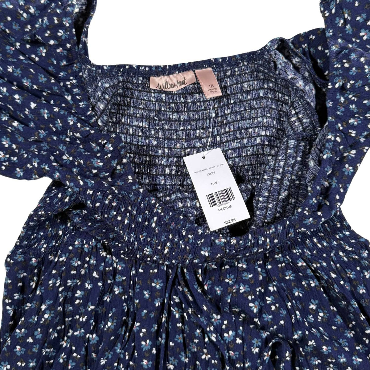 Original retail tag attached to the Willow + Root women's floral top.