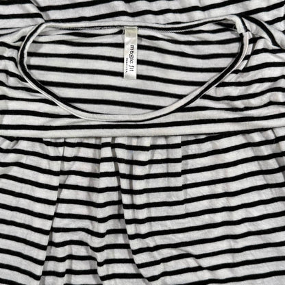 Magic Fit brand tag on a women's large black and white striped peplum top.