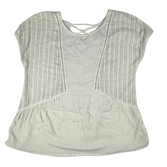 Front view of a women's medium Miss Me light sage green blouse with crochet trim.