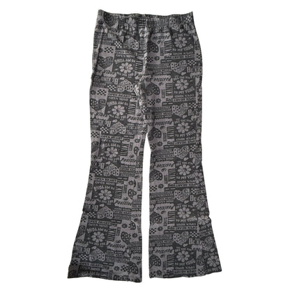 Back view of Zoe + Liv women's XL flare leggings with inspirational graphics