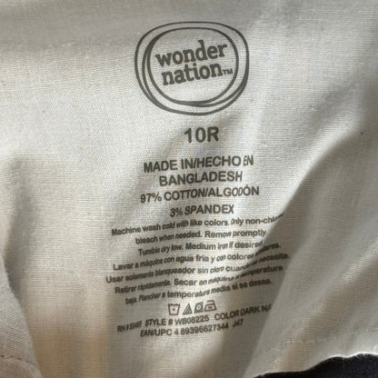 Wonder Nation boys size 10R brand and material tag showing 97% cotton and 3% spandex