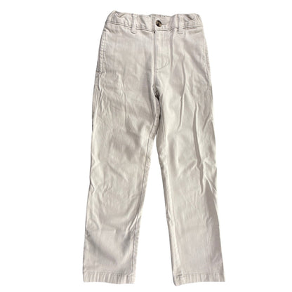 Front view of Wonder Nation boys’ size 10R tan chino pants with button closure and straight legs.