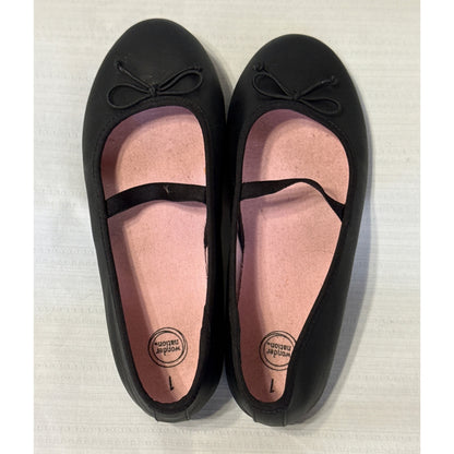 Top view of Wonder Nation ballet flats showing pink insoles with light marks, size 1 labels, and black elastic straps.
