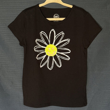 Wonder Nation girls black T-shirt with large white daisy graphic and yellow sequin smiley face center, size 6–6X.