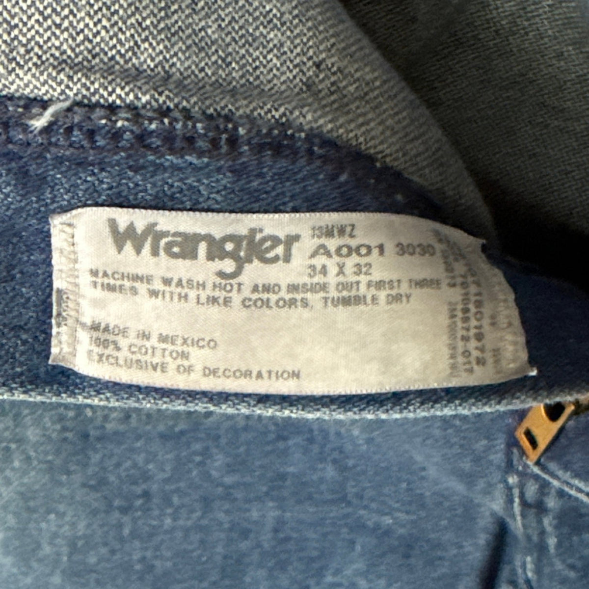 Wrangler 13MWZ men’s jeans label showing size 34×32, 100 percent cotton, and Made in Mexico
