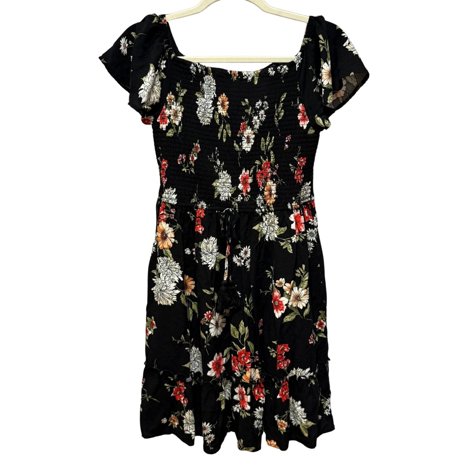 Xhilaration juniors medium black floral smocked dress with flutter sleeves and tiered ruffle hem.