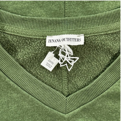 Zenana Outfitters brand label and V-neck trim on olive green sweatshirt