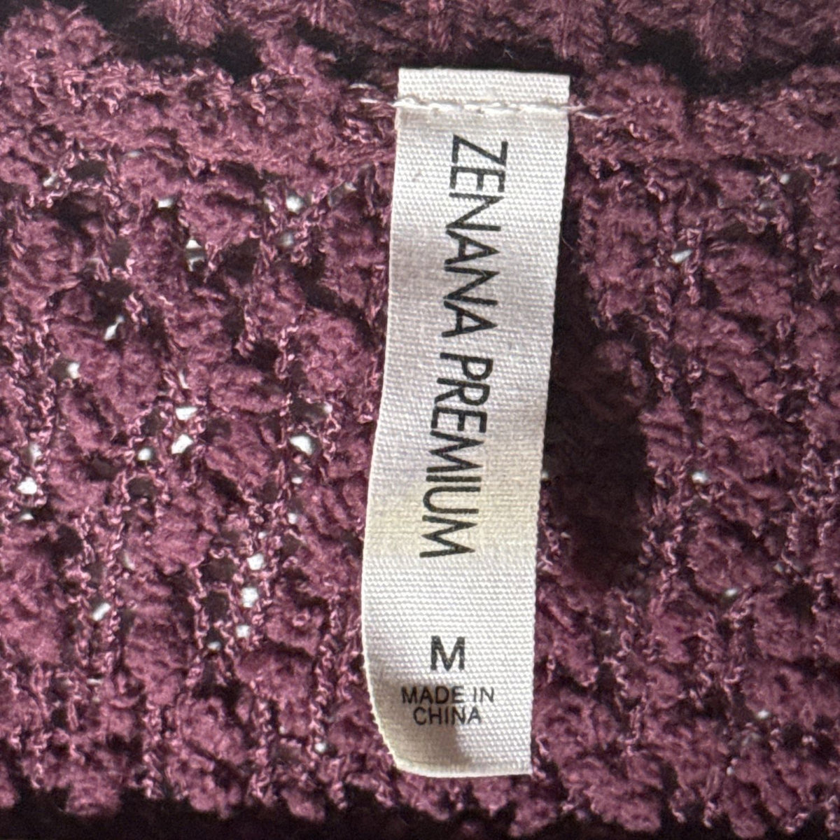 Zenana Premium size Medium label inside the plum cardigan.