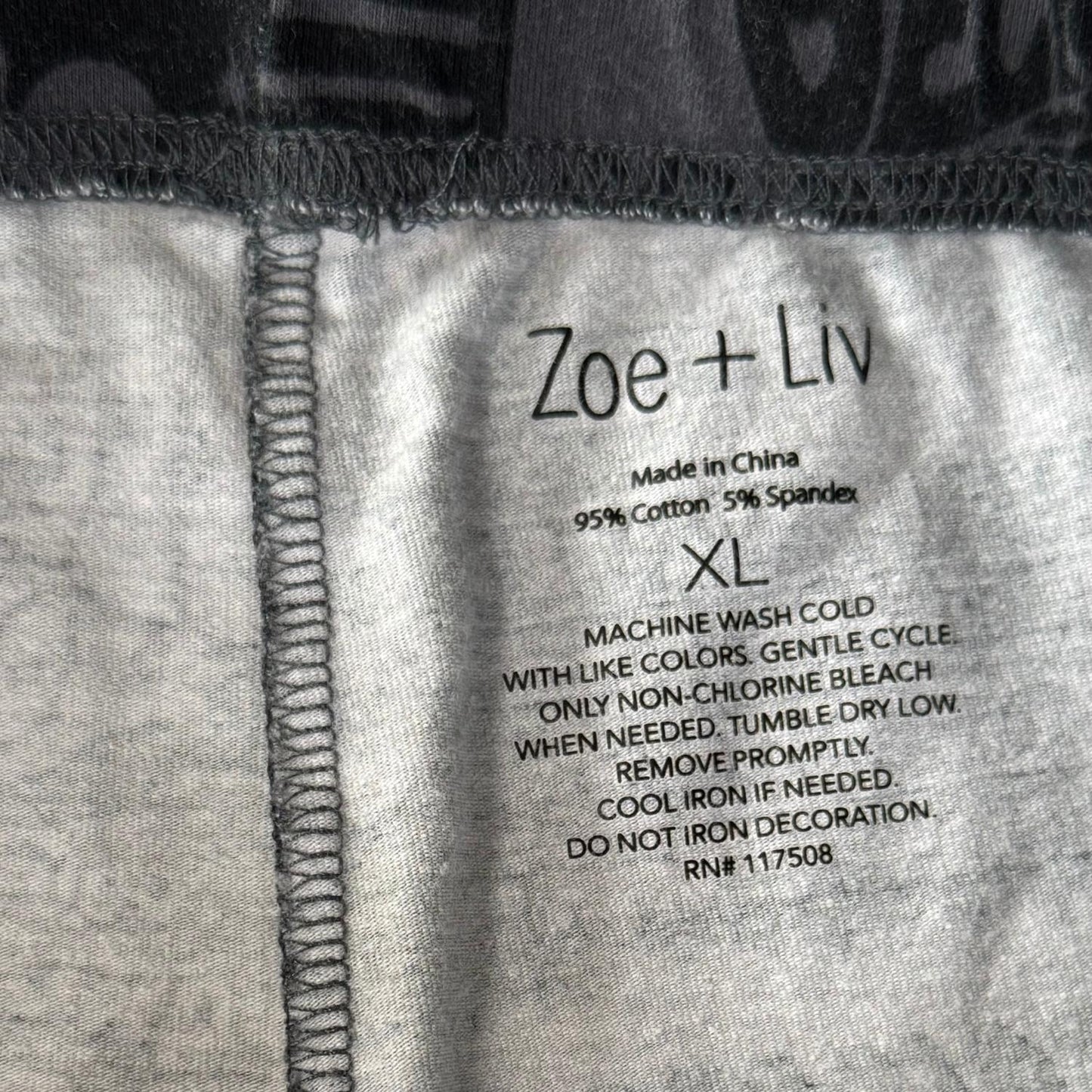 Zoe + Liv brand tag on women's XL graphic leggings