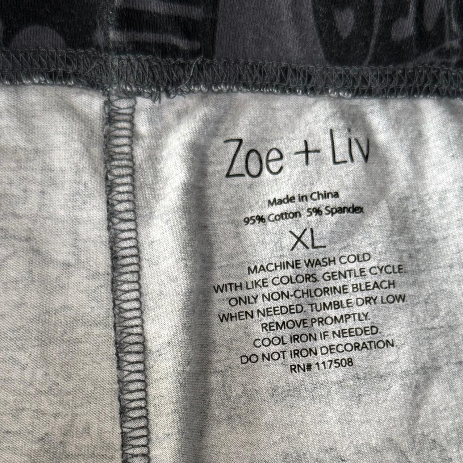 Zoe + Liv brand tag on women's XL graphic leggings