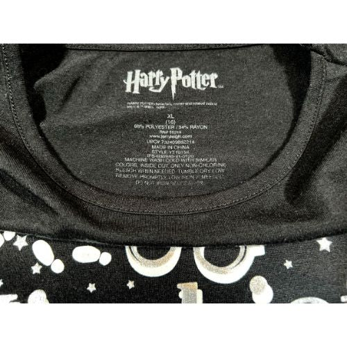 Harry Potter Mischief Managed Black Graphic Tee (Est. Orig. Retail Price $20.00) Size: Big Girl Size XL - 16 Color: Black Print: Silver and White Graphic, "Mischief Managed, I solemnly swear I am Up To No Good" Features: Short sleeve Material: 66% Polyester, 34% Rayon Condition: Gently Used, minor pilling (easily remove with fabric shaver) tag - Our Families Attic